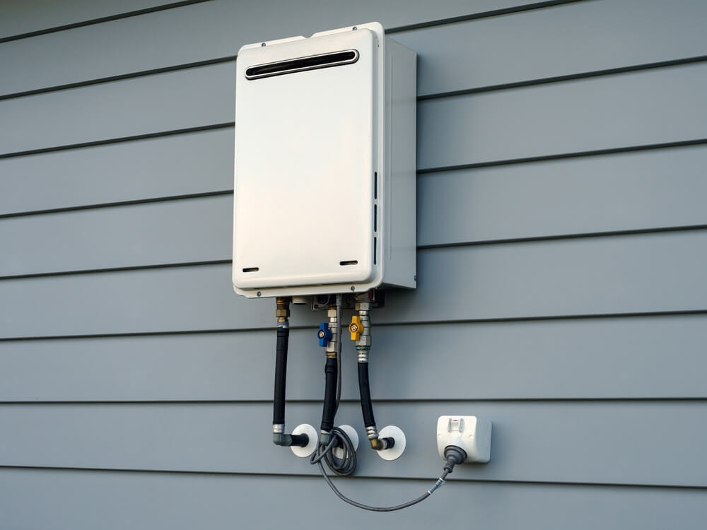 Tankless instantaneous hot water heater unit